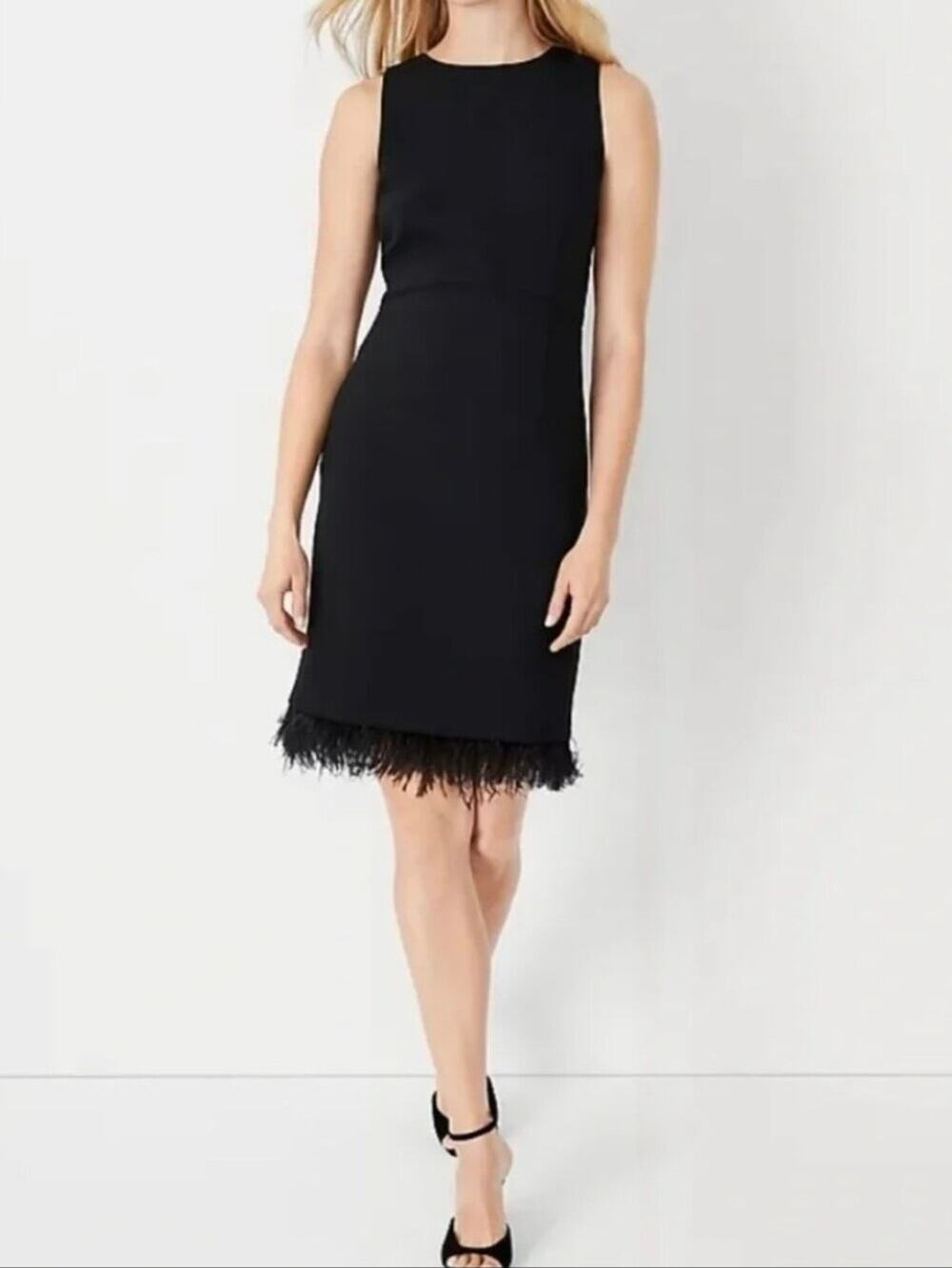 Ann Taylor Black Sleeveless Sheath dress with feathered Bottom Hem Size 14